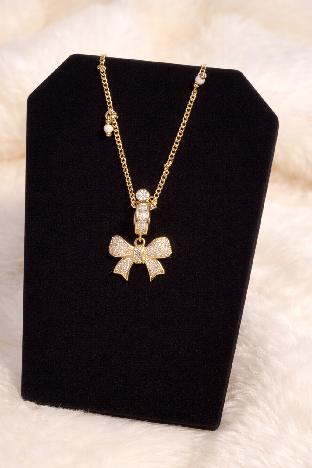 Golden Bow Crystal Charm Necklace